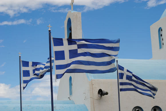 Greek Orthodox church with Greek flags