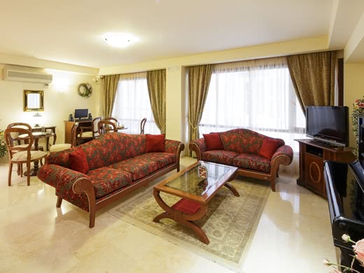 Hotel lounge with red sofas