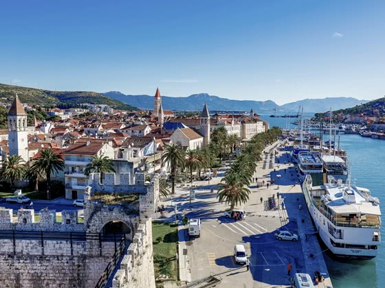 Aerial view of Trogir promenade, town and ships