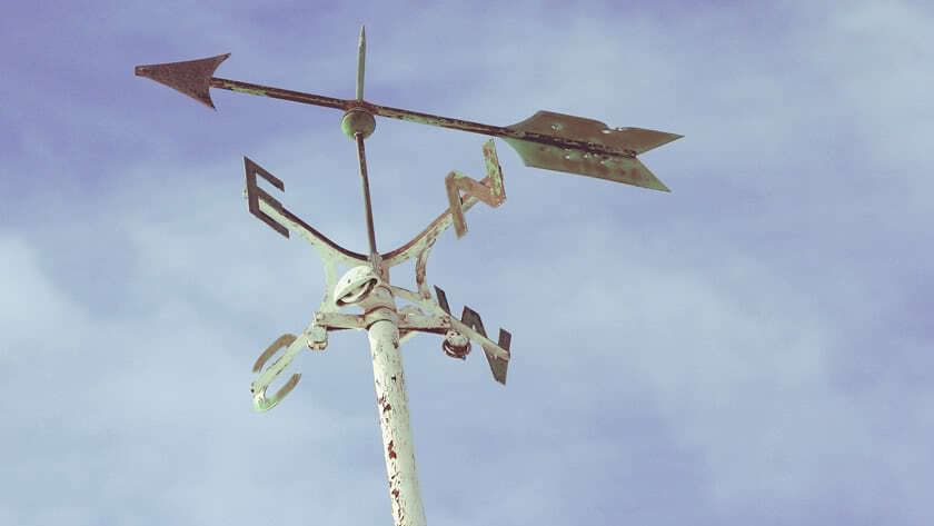 Weathervane against a blue sky