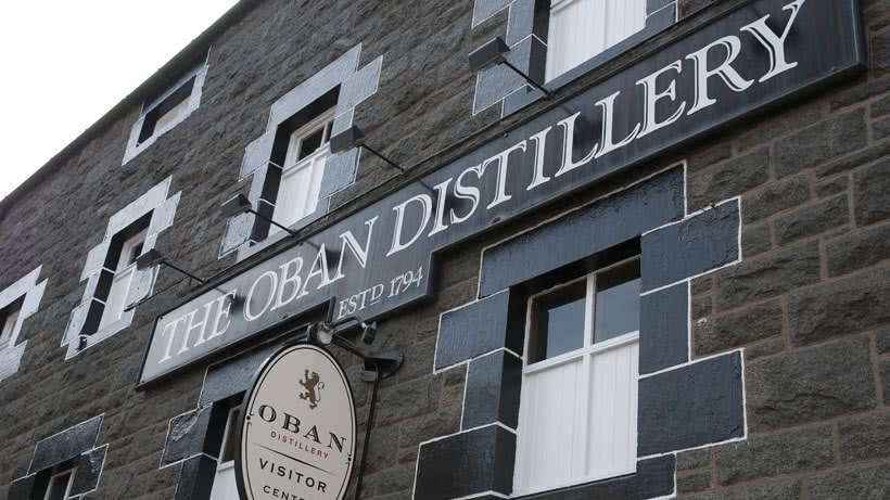 Stone building with Oban Distillery sign